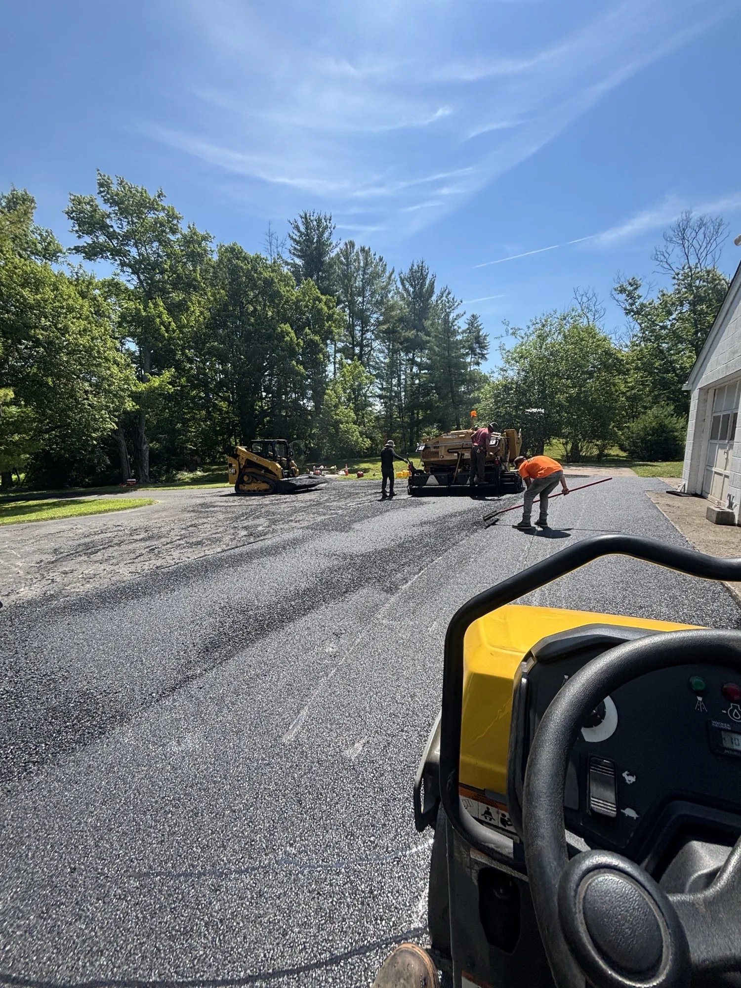 All County Paving crew and equipment on a residential install